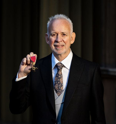 Phil Receives OBE For Services To Music