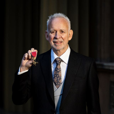 Phil Receives OBE For Services To Music